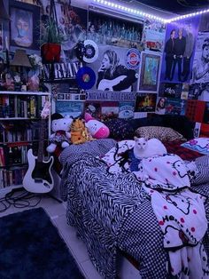 a bed room filled with lots of books and stuffed animals