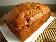 a loaf of bread sitting on top of a white plate