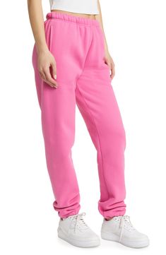 Encourage kindness everywhere you go in these supersoft sweatpants made from cotton-blend fleece. 31" inseam; 10" leg opening; 11" front rise; 15" back rise (size XS) Elastic waist with internal drawcord Front slant pockets 50% cotton, 50% polyester Machine wash, line dry Imported Pink Sweats With Elastic Waistband For Loungewear, Pink Elastic Waistband Sweats For Loungewear, Full-length Sweatpants For Winter, Spring Fleece Athleisure Pants, Pink Sweatpants With Ribbed Waistband, Pink Relaxed Fit Pants With Ribbed Waistband, Pink Straight Leg Sporty Sweatpants, Sporty Pink Straight Leg Sweatpants, Pink Sweatpants With Elastic Waistband For Jogging