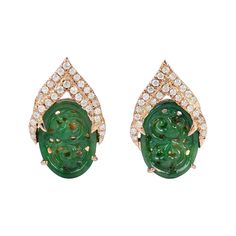 These hand carved Jade earrings are meticulously crafted in 14-karat gold. It is set in 2.5 carats of Jade and .22 carats of glimmering diamonds. FOLLOW MEGHNA JEWELS storefront to view the latest collection & exclusive pieces. Meghna Jewels is proudly rated as a Top Seller on 1stDibs with 5 star customer reviews. All items manufactured by us are handmade and can be customized or redesigned. Composition Size-18X11MM Total Weight-3.83 Gold Weight(Gms)-3.266 Diamond Wt(Cts)-0.22 Jade Wt(Cts)-2.5 Carved Jade, Jade Earrings, Earrings Diamond, Jade Carving, Diamond Stud, Blake Lively, Diamond Earrings Studs, Diamond Studs, Jewelry Earrings Studs