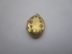 1" x 1 1/2".  Used but nice condition.  Quality made.  Fancy engraving.  Marked  :  1/20 12 K G.F. Vintage Gold Etched Locket Necklace, Victorian Stamped Gold Jewelry, Gold Etched Locket Necklace For Memorial, Vintage Locket Necklace With Hallmark For Memorial, Vintage Hallmark Locket Necklace For Memorial, Vintage Stamped Pendant Locket Necklace, Vintage Pendant Jewelry With Engraving Option, Antique Hallmarked Pendant Jewelry, Antique Gold Engraved Locket Necklace Collectible