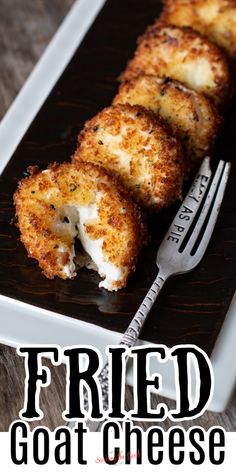 fried goat cheese is on a plate with a fork