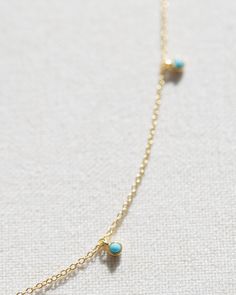 Made with 14k gold vermeil, this dainty necklace features beautiful turquoise satellite beads. Chain length is adjustable. measures 17.5" at longest, 15.5" at shortest Gold Adjustable Minimalist Turquoise Necklace, Minimalist Adjustable Gold Turquoise Necklace, Adjustable Minimalist Gold Necklace, Dainty Turquoise Jewelry With Delicate Chain, Dainty Blue Turquoise Necklace With Adjustable Chain, Dainty Turquoise Necklace With Delicate Chain, Adjustable Turquoise Jewelry With Delicate Chain, Dainty Turquoise Necklace With Adjustable Chain, Dainty Blue Necklaces With Satellite Chain