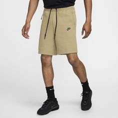 Pull on these Tech Fleece shorts for laid-back comfort that lasts all day long. Our premium, smooth-on-both-sides fleece feels warmer and softer than ever, while keeping the same lightweight build you love. With a relaxed fit that hits just above the knee, these comfy shorts feature signature Tech Fleece details to keep your look polished. Pair them up with a tee or a Tech Fleece hoodie for a uniform finish. Nike Tech Shorts, Grey Nike Shorts, Short Nike, Tech Fleece Hoodie, Nike Sportswear Tech Fleece, Nike Brown, Nike Short, Nike Tech Fleece, Shorts Nike