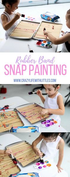 two children are painting on wooden boards with paintbrushes