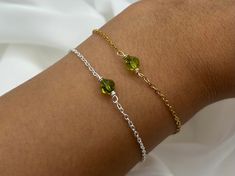 Save when you shop through my website, I'd appreciate it 💚- https://shorturl.at/dGU49 ✨check out the rest of my crystal jewellery here - https://etsy.me/3nxyN99 ✨ 🤍 Handmade peridot bracelets in silver or gold, made with so much love & the most positive intentions 🤍 ✨ Made to order - choose your specific wrist size  ✨6mm crystal beads  ✨ Each bracelet is gift wrapped in an organza gift bag with recyclable packaging ✨ Tarnish resistant stainless steel  ✨Peridot protects against difficulties an Green Beaded Chain Bracelets As A Gift, Green Beaded Bracelet For Gift, Green Beaded Chain Bracelet As Gift, Green Beaded Chain Bracelet For Gift, May Birthstone Jewelry With Faceted Beads As A Gift, Faceted Beads Bracelets As May Birthstone Gift, May Birthstone Bracelets With Faceted Beads As Gift, Faceted Beads Bracelet For May Birthstone Gift, Spiritual Beaded Bracelets As Gift