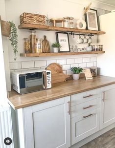 the kitchen counter is clean and ready to be used for cooking or baking, as well as other items