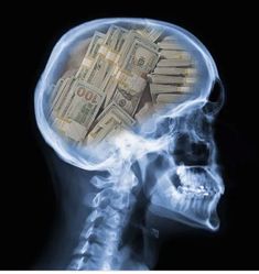 a skeleton with money in its head