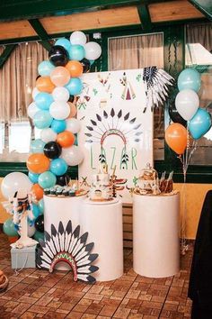 balloons and decorations are on display at a party