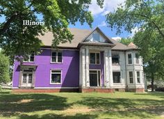 a purple house with trees in front of it and the words illinois painted on it