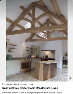 an image of a kitchen with wooden beams