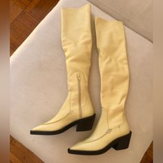 Brand New Over The Knee Khaite Charleston Over The Knee Boot In Light Yellow $1980 Fitted Yellow Boots For Spring, Chic Yellow Boots For Fall, Yellow Fitted Boots With Round Toe, Spring Yellow Leather Boots, Yellow Leather Spring Boots, Chic Cream Fitted Knee-high Boots, Yellow Leather Boots With Pointed Toe, Casual Cream Knee-high Boots, Beige Wide Calf Knee-high Boots