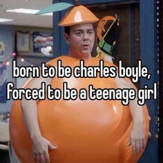 a man in an orange costume with the words born to be charles boy, forced to be