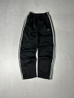 Vintage 90s Adidas Pants, Black Track Pants, Pre-owned Pants, Track Pants - Men's Small, Mens Bottoms Size On Label: Small Recommended Size: Men's Small Measurements: Waist: 28" - 32" Inseam: 30" 90s Style Streetwear Trousers, 90s Streetwear Trousers, 90s Style Cargo Pants For Streetwear, Wide Leg Pants With Three Stripes For Streetwear, Vintage Full-length Bottoms For Streetwear, 90s Style Black Pants, 90s Style Full-length Black Pants, Black Full-length 90s Style Pants, Retro Black Pants For Streetwear