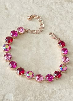 Pretty bracelet featuring an ombré of shades of ruby to pink 8mm round Swarovski crystals.  Shown in the rose gold metal finish.    Adjustable between 6 1/2 and 8 inches.   Thanks for stopping by! Barbie Colors, Pink Bracelets, Beautiful Bangles, Bling Rhinestones, Bracelet Tennis, Prom Jewelry, Big Pockets, Indian Jewelry Sets, Watch Bracelet