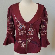 Free People Burgundy Embroided Flower Blouse. Low Neck Line And 3/4 Sleeves. Brand New With Tags. Fitted V-neck Embroidered Top For Spring, Fitted V-neck Blouse With Floral Embroidery, Fitted Red Embroidered Top For Spring, Flower Blouse, Neck Line, Embroidered Blouse, Free People Tops, Autumn Fashion, Free People