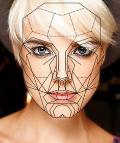 a woman's face with lines drawn on her face and the image of a woman's face