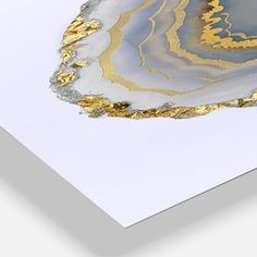 an abstract painting with gold and silver paint on white paper by corbi studio