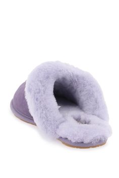 UGG scufette slides crafted in suede with shearling interior, side lettering logo and molded rubber sole. Composition: 83% leather, 17% TR Ugg Scuffette, Shearling Slippers, Duffel Bag Backpack, Lettering Logo, Sheepskin Boots, Heron Preston, Lilac Purple, Versace Men, Ugg Shoes