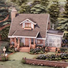 a doll house is shown with flowers in the front yard and trees on the other side