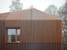 a building with wooden slats on the side