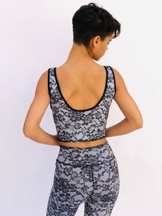 These comfortable and cute cropped bralets can be worn with the matching sports bra for added support. Paired with one of the many matching shorts, this top can be worn in the studio, as a bathing suit or out on the street. double sided with 2 different yet complimenting prints, made from recycled water bottles and spandex UV protection Black Activewear Crop Top With Built-in Bra, Black Crop Top Activewear With Built-in Bra, Casual Training Crop Top With Built-in Bra, Cropped Black Sports Bra For Summer, Black Cropped Sports Bra For Summer, Sportswear Crop Top With Built-in Bra And Racerback, Black Racerback Crop Top For Pilates, Summer Cropped Black Sports Bra, Black Casual Crop Top For Pilates