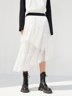 MO&Co. Women's Elasticated Ruffle Laced Skirt Features : - Midi length with a flowy fit- Elasticated waist- Asymmetrical, tulle ruffle layers design Code: MBC1SKTT11The back length of size S is 82cmMATERIALS & CARE Material: 100% PolyesterGentle machine wash below 30°CDo not bleach, hang to dry in the shadeDo not tumble dry, do not ironDo not dry clean, do not soakDo not rub, wash separately in mesh bagWash with neutral detergentPlease select your own size in the size chart according to your fig Flowy White Ruffled Skirt, White Midi Skirt With Ruffles, Flowy Asymmetrical Lace Skirt, Asymmetrical Lace Ruffled Skirt, White Balletcore Skirt With Ruffles, White Lace Skirt, Black Lace Skirt, Lace Midi Skirt, Lace Midi