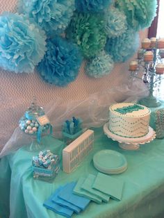 a table with blue and white decorations on it