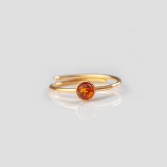 Discover our sustainable 🌿 ring collection - each piece of jewelry is unique with a unique gemstone. A special lucky charm with a very personal meaning. Ideal as a gift or as a personal treat for yourself. Filigree stacking ring with a shimmering amber. ▸ individually adjustable from size 50 to 58 (EU) ▸ Ideal as a gift thanks to the high-quality jewelry box ▸ The piece of jewelry is made of sustainable recycled 925 sterling silver (optionally gold-plated or rose gold-plated). 🌿 NEW & IMPROVED: NOW WITH 3 MICRON GOLD PLATING ▸ Your 925 gold-plated jewelry now receives a 3 micron thick gold plating for long-lasting joy. ▸ For care tips, please take a look at our FAQs. 🌿 FIND YOUR FAVORITE Looking for another gemstone? Check out our entire ring collection: https://www.etsy.com/de/shop/Jen Adjustable Amber Open Ring, Adjustable Amber Promise Ring, Gold Stacking Ring, Ringe Gold, Adjustable Jewelry, 925 Silver Ring, Sustainable Jewelry, Unique Gemstones, Stacking Ring