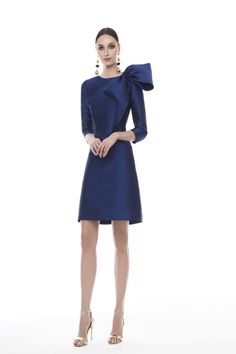 Looking for a unique and eye-catching dress? The Frascara 4334 is perfect for making a statement. It features a 3/4 sleeve dress bodice with draped ruffled bow detail, an A-line skirt silhouette, and a hidden back zipper. Plus, it's lined with satin for a luxurious look and feel. Spring Gala Mini Dress With Bow, Elegant Mini Dress With Satin Bow For Spring, Elegant Mini Dress With Satin Bow For Cocktail, Elegant Cocktail Mini Dress With Satin Bow, Chic Formal Mini Dress With Satin Bow, Wedding Dress With Bow And Long Sleeves, Long Sleeve Wedding Dresses With Bow Detail, Spring Cocktail Evening Dress With Bow, Elegant Long Sleeve Event Dress