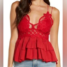 Red Lace Bralette Cami With Flowy, Tiered Bottom Design And Intricate Crochet Lace Top Crisscross Straps A-Line Silhouette Lined Bust Stretchy Back Panel Intimately Free People Bust: Approximately 14 Inches Pit To Pit (But Has Stretchy Back Panel) Length: Approximately 21 Inches Hand Wash Cold Viscose, Nylon And Cotton Red, Cherry, Casual, Dressy, Boho, Bohemian, Strappy Sleeve, Spaghetti Strap, Western, Beach, Country, Cottagecore, Lace, Knit, Crotchet B2 Red Lace Bralette, Red Camisole, Free People Adella, Velvet Cami, Free People Tank Top, Cotton Camisole, Cropped Camisole, Crochet Lace Top, Lace Camisole