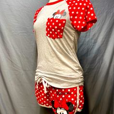 Beautiful And Adorable New Disney Minnie Mouse Matching Pajama Set Size: S Color: Gray, White, Red New Without Tags Polka Dot Tie String Shorts With Minnie Print Short Sleeve Gray Shirt And Polka Dot Sleeves Pocket With Minnie Peeking Out Authentic Original Disney Minnie Mouse Short Sleeve And Shorts Set Cute Short Tops For Sleepover, Mickey Mouse Cotton Sleepwear For Bedtime, Cotton Mickey Mouse Sleepwear For Bedtime, Cute Minnie Mouse Sleepwear, Playful Loungewear Short Set, Minnie Mouse Cotton Sleepwear, Cute Minnie Mouse Sleepwear For Pajama Party, Cotton Minnie Mouse Sleepwear, Minnie Mouse Cotton Sleepwear For Sleepover