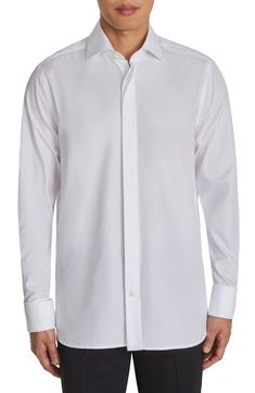 Exude classic charm and sophistication in this pristine button-up tailored from premium two-ply cotton. Hidden-button placket Spread collar Long sleeves with French cuffs 100% cotton Dry clean Made in Turkey Classic White Shirt With Covered Buttons, Elegant Long Sleeve Dress Shirt For Daywear, Classic Long Sleeve Dress Shirt With Button Closure, Elegant White Shirt With Hidden Button Closure, Classic Dress Shirt With Concealed Placket For Daywear, Luxury Spread Collar Shirt For Daywear, Elegant Shirt With Button Closure For Daywear, Classic Top With Concealed Placket, Classic White Tops With Covered Buttons