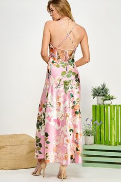 Floral Print Open Back Satin Slip Dress Get ready to turn heads and feel absolutely stunning in this floral print open back satin slip dress. Featuring a silky smooth fabric and a flirty cut, this dress will have you feeling confident and beautiful. Perfect for any occasion, you'll make a statement and be the center of attention wherever you go. Elevate your wardrobe with this must-have piece! 100% Mixed Poly Floral Print Open Back Satin Slip Dress Satin Dresses With Spaghetti Straps For Brunch, Satin Maxi Dress With Tie Back, Fitted Satin Maxi Dress With Floral Print, Fitted Satin Dress With Tie Back For Spring, Pink Floral Print Backless Maxi Dress, Feminine Satin Maxi Slip Dress, Feminine Satin Maxi Length Slip Dress, Satin Floral Print Maxi Dress For Date Night, Floral Satin Maxi Dress For Date Night