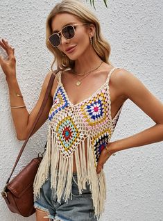 Product category: halter topCollar type: V-neckVersion: slim typeLength: short (40cm＜ < length ≤50cm)Pattern: hollow outColor: white, beigeSize: average size Bohemian V-neck Halter Top For Summer, Summer V-neck Crop Top For Vacation, Trendy V-neck Halter Top For Vacation, Summer Festival V-neck Halter Top, Beige V-neck Tank Top For Summer, Bohemian V-neck Crop Top For Beach Season, Summer V-neck Beach Crop Top, Trendy V-neck Crop Top For Beach, Trendy V-neck Tank Top For Beach