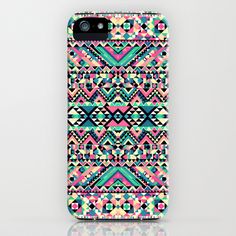 an iphone case with colorful geometric designs on the front and back cover, all in different colors