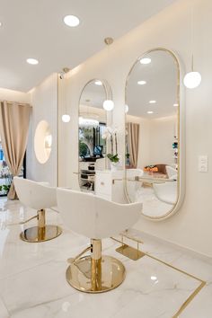 a large mirror sitting on top of a white counter