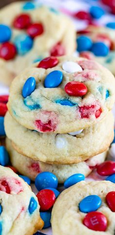 red, white and blue cookies are stacked on top of each other