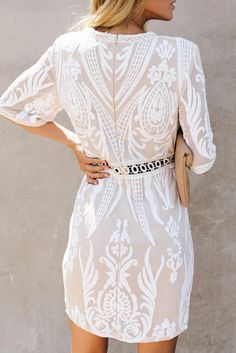 White Embroidered Sequin Mini Dress White Embroidered Mini Dress For Party, Chic Embroidered Mini Dress For Wedding, White Embroidered Short Sleeve Dress For Party, White Short Sleeve Embroidered Party Dress, White Embroidered Short Sleeve Party Dress, White Fitted Short Sleeve Embroidered Dress, Fitted White Embroidered Dress, Elegant White Embroidered Mini Dress, Elegant Fitted Embroidered Dress For Brunch