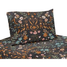 an image of a bed set with floral print on it's cover and pillow cases