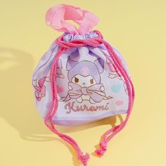 Carry your small travel essentials using this kawaii handbag! It showcases a cute illustration of Kuromi surrounded by big ribbons. This bag also features a gusset-style bottom and drawstring closure so you can easily put your things inside. Kawaii Pouch Bag With Cute Design, Cute Kawaii Pouch Bag, Kawaii Cute Pouch Bag, Kawaii Multicolor Bags As Gifts, Harajuku Pouch Bag As Gift, Harajuku Style Pouch Bag Perfect For Gifts, Harajuku Style Pouch Bag For Gift, Harajuku Style Pouch Bag As Gift, Harajuku Style Cute Shoulder Bag For Gift