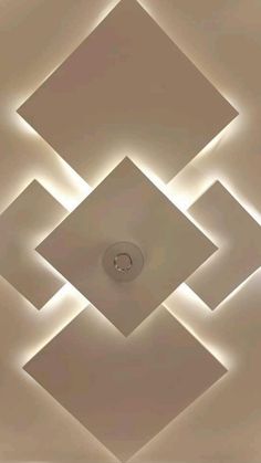 an image of a ceiling with lights in the shape of squares and rectangles