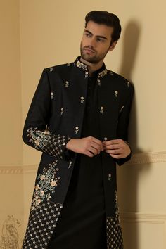 Black jacket embroidered with floral patterns embellished with cutdana and sequin. Comes with plain kurta and pant.
Components: 3
Pattern: Embroidered
Type Of Work: Cutdana,Squin
Neckline: Jacket and Kurta: Mandarin Collar
Sleeve Type: Jacket: Full
Fabric: Semi Raw Silk
Color: Black
Other Details: 
Side slits
Closure: Kurta: Button
Occasion: Sangeet,Cocktail and Reception - Aza Fashions Plain Kurta, Mandarin Collar Jacket, Kurta Set For Men, Floral Jacket, Silk Jacket, Fashion App, Embroidered Jacket, Kurta Set, Embroidered Silk