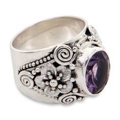 Adorned by frangipani blossoms this design is the creation of Buana in Bali. Crowning ornate sterling silver settings a faceted 3.5-carat amethyst the birthstone of February takes center stage in a ring of feminine elegance. .925 Sterling silver Amethyst Cocktail Ring, Paw Print Jewelry, Silver Flower Ring, Ribbon Jewelry, Fair Trade Jewelry, Printed Jewelry, Flower Ring, Silver Flowers, Amethyst Ring