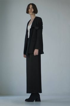 Elegant and luxurious midi skirt. Complemented by a diagonal seam and a deep neckline on the back. It elongates the silhouette beautifully. Looks great goes well with the Aubrey jacket, made of the same material as the drapery on it. Elegant Asymmetrical Outerwear For Office, Elegant Asymmetrical Outerwear For Work, Semi-formal Asymmetrical Chic Blazer, Elegant Asymmetrical Workwear Outerwear, Chic Asymmetrical Semi-formal Blazer, Asymmetrical Fitted Evening Blazer, Fitted Asymmetrical Blazer For Evening, Evening Blazer With Structured Shoulders, Chic Evening Outerwear With Structured Boning