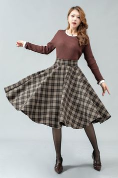 ★★ Welcome to my Ylistyle's shop！！！ This midi plaid high waist circle wool skirt looks simple and elegant.  Our tartan skirt can well show your elegant temperament and taste.   Made of high-quality fabric, giving you a good touch and very comfortable to wear. ★★FEATURES 25% wool, other fiber,nylon Polyester lining Two Side pockets Back zipper closure Midi skirt Wool circle skirt Tartan skirt Party skirt Autumn winter wool skirt Dry clean ★★ The model's height approx 170 cm (5′ 7″) with the 84 cm (33") bust, 66 cm (26") waist. She is wearing the wool skirt in size XS (US2) ★★ Please select custom order according to the follow situation Can't find your size Your height is over 175cm Your weight is over 75kg Request Length custom Request sleeve length ★★ Get your size in Size Chart with your Retro A-line Winter Skirt, Plaid A-line Skirt With Lining, Fitted Full Skirt In Plaid, Retro A-line Skirt For Winter, Plaid Relaxed Fit Skirt For Fall, Relaxed Plaid Skirt For Fall, Fall Plaid Relaxed Fit Skirt, Long Plaid Skirt For Fall, Plaid Long Skirt For Fall