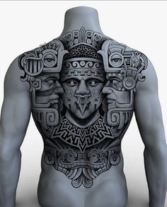 the back of a man with tattoos on his body