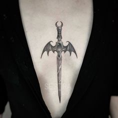 #tattoo #tattoodark #tattoodagger #dagger #illustrationtattoo Bat Dagger Tattoo, Sternum Tattoo Dagger, Dagger Sternum Tattoo Women, Gothic Dagger Tattoo, Dagger Chest Tattoo Female, Dagger Tattoo Design, Grunge Tattoos, Grunge Tattoo, Goth Tattoo