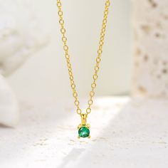 This stimulated Emerald / Topaz pendant in 18K yellow gold plated over 925 Sterling silver with bezel lab-growing stones. • Material : 925 sterling silver• Finish : 18k gold plated• Stone: Cubic Zirconia - 3mm• CHAIN: Adjustable clasp from 16" to 18" (40 to 45 cm)• WEIGHT: 2.13 g Emerald Pendant Necklace, Emerald Necklace Pendant, Half Bezel, Tension Setting, Topaz Pendant, Emerald Pendant, Solitaire Necklaces, Emerald Necklace, Gold Necklace Women