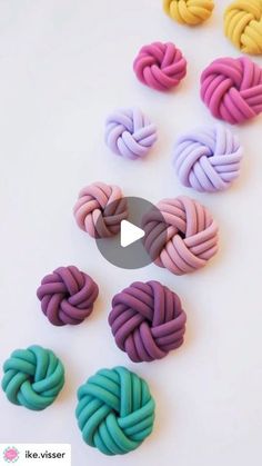 the video is showing how to make an origami knot out of polymer beads